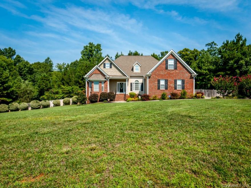 Gorgeous 1.5 story home on 1 acre of land extremely close to Rock Hill! Hardwood floors throughout home w/ ceramic tile in the baths. 2 gas fireplaces in the Great Room & Master Bedroom. Master bath has his & her sinks, Jacuzzi tub, & separate shower! Bonus Room upstairs w/ half bath that can be turned into whatever suits your needs! Water softener system! Custom drapes! Walk out to the covered back deck overlooking a beautifully landscaped yard w/ irrigation system! Come check it out!