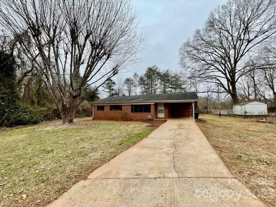 3 bedroom 1.5 bath brick ranch at the end of a dead in road on over a half an acre in Forest City.  This is an estate and will need some tlc but can be a great first home in a wonderful setting!  HVAC installed and seller said baseboard heat may still work as well.  Being sold "as is"  Seller will supply a stove with a good offer for lending purposes.