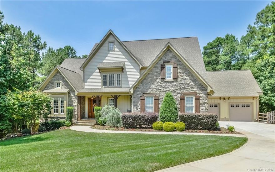 Magnificent custom home on 1.98 acre with over 6000 SF, finished basement & 4 car garage. Main level boasts 2 story home office & great room, formal dining, master suite, spacious open kitchen with island/gourmet appliances, large laundry room, keeping room opens to lovely screened porch for outdoor living with wood burning fireplace. 3 BR suites, Bonus, Loft on Upper Level. Lower Level Den/Recreation, 2nd living qtrs/kitchen. Unique opportunity on one of the most desirable streets in The Farms!