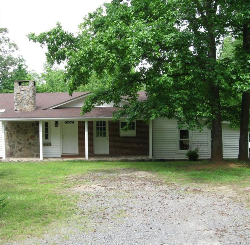Quaint home on 5 acres in country setting.  The home features a front porch, two bedrooms, one bathroom with additional room that is unheated, possible bedroom.  You will enjoy sitting by the stone fireplace in the family room.  The kitchen has plenty of cabinets and newer stove. Laundry area in utility/mud room.  Newer roof, finished hardwood floors, tile floors, HVAC duct system, and vents.  Updated bathroom.