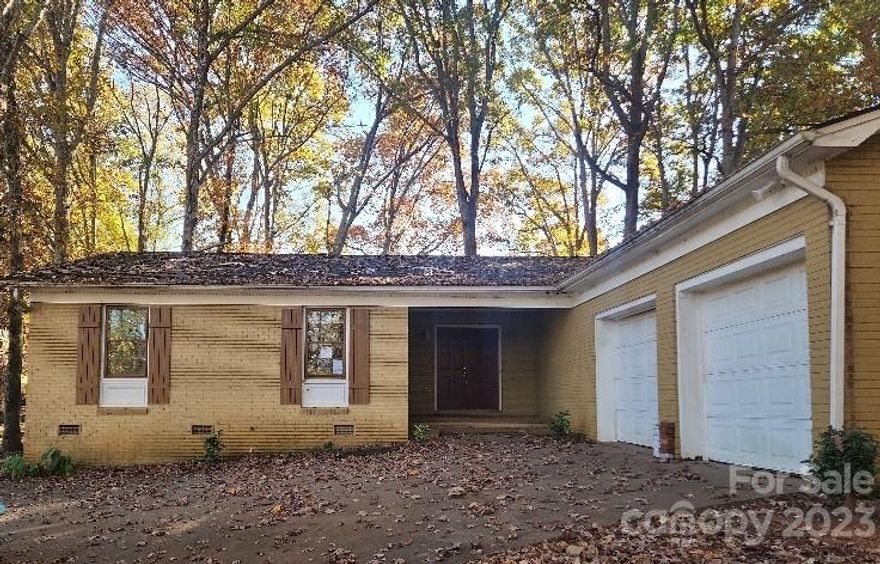 3 bed 2 bath brick ranch with double attached garage. Floorplan includes an open kitchen/living/dining area, master suite w private full bath, 2 addt bedrooms, and a 2nd centrally located bathroom. Home sold AS-IS/WHERE-IS with ALL FAULTS. Buyer or buyers agent to verify all stats. Seller or sellers agent make no representations or warranties concerning condition of home, its mechanicals, or property boundary locations.