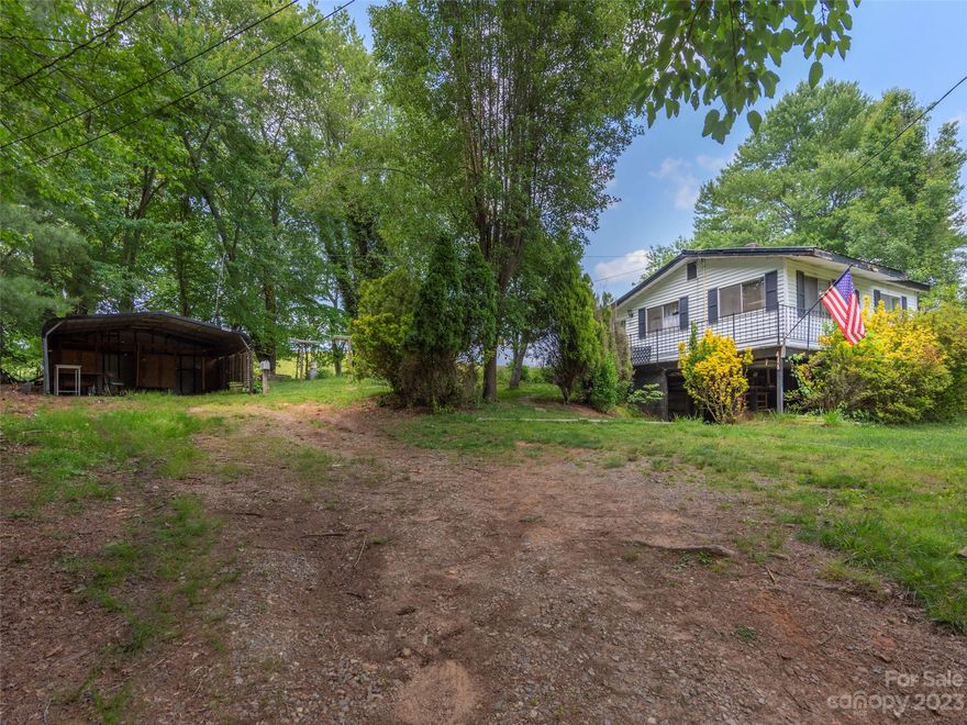 Location, Location, Location! Approx. 2 miles past Biltmore Lake, this is a great opportunity for investors! This house is a fixer upper with lots of potential just waiting for your creativity and personal touch. Level back yard perfect for entertaining with gorgeous pastoral views. Double detached carport. Heat source is Monitor Heater. Being sold As-Is.