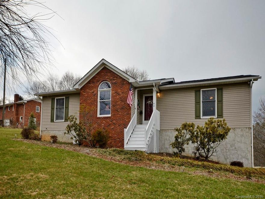 Country setting, only 15 minutes to Asheville, schools and shopping close by-Mountain views, mature landscaping, 15x30 deck for entertaining.This open and light filled home lets you enjoy nature from all rooms on the main level. Two master bedrooms and two baths on main. Unfinished area in basement. Roof, plumbing updates (2012) Heat Pump(2010) Seller is the original owner!!!