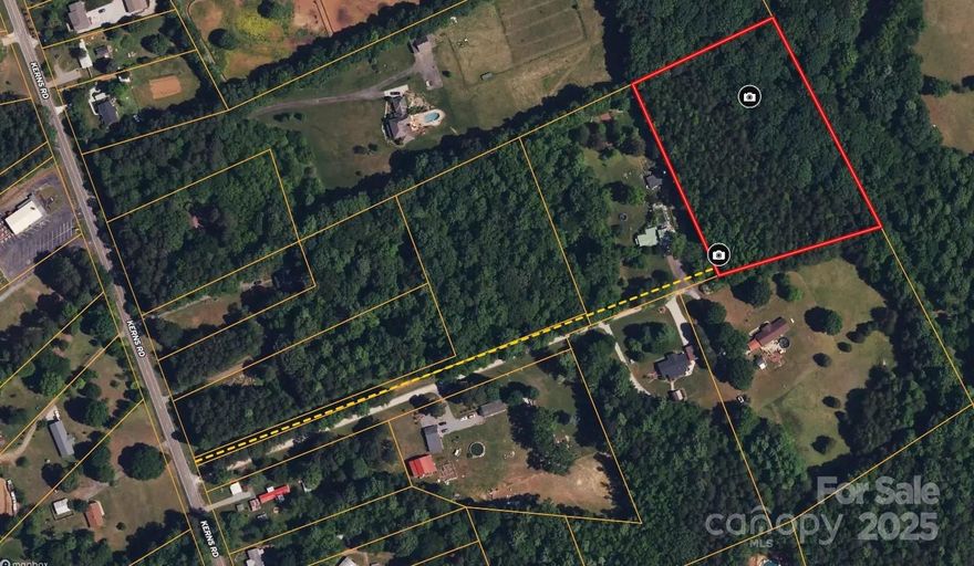 Escape to Your Private Huntersville Oasis!  Discover the perfect setting for your dream home on this beautiful 4 acre, flat, and wooded lot. Tucked away in a private and peaceful location, this property offers the best of both worlds: a serene country atmosphere with all the modern conveniences you need.  Imagine building your custom home surrounded by mature trees, with riding stables, open fields, and picturesque pastures as your neighbors. This unique rural feel is a rare find so close to everything.  Unbeatable location makes commuting and daily errands are a breeze from this prime spot. You're just a short drive from the shops, restaurants, and services along Gilead Road in Huntersville. For more options, Mountain Island shopping is under 20 minutes away, and if you work in the city, Uptown Charlotte is a quick 20-minute drive.  This is more than just a lot; it's a chance to create the lifestyle you've always wanted. Don't miss out on this unique opportunity to own a slice of country paradise with easy access to the city. Lot size derived from tax card, new survey needed to confirm.