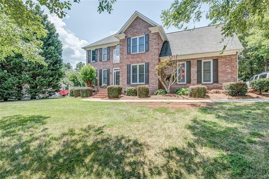 Beautifully updated full brick on large private lot with space for RV parking. Upstairs bonus being used as 4th bedrm, has large walkin closet. Bright updated kitchen w/new granite tops & stainless appliances including double oven. Master suite w/cathedral ceilings & gorgeous updated bath w/custom tile & cabinetry. Hardwoods on main. Gorgeous covered 14x14 porch for outdoor living overlooking fenced, flat backyard. Fireplace in living rm has been covered by built in ET center. Roof new in 2011.