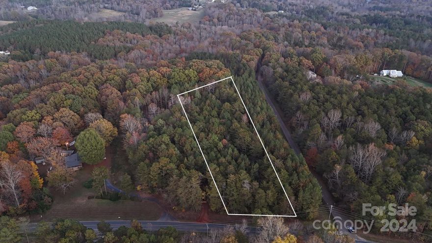 Almost 3 acres of land ready to build your dream home!  Want to have your own workshop, barn, pool?  You can have it here!  Located just minutes from downtown Troutman and Lake Norman, you can have city and lake access with country living.
