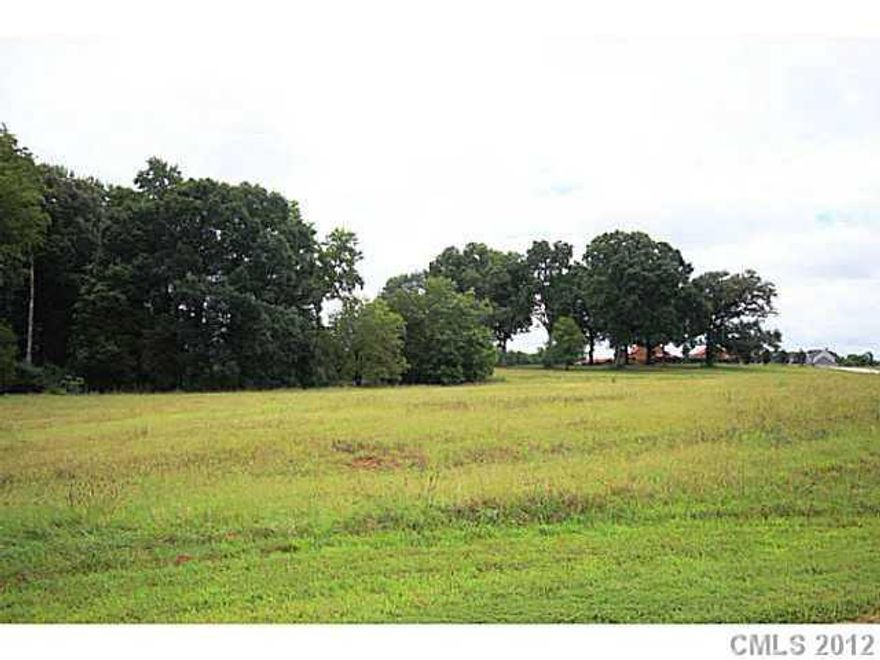 SERENITY AND CALMNESS WILL SURROUND YOU WHEN ENTERING THIS AWESOME COMMUNITY. READY TO BUILD  LOT. YOUR CUSTOM DREAM CAN BE YOUR REALITY! COMMUNITY OFFERS WALKING TRAILS, COMMUNITY PARK WITH PLAY GROUND AND FISHING POND. FOR A SEPARATE FEE, PRIVATE CLUB HOUSE AND BARN ARE AVAILABLE FOR USE. BARN SHOWN BY APPOINTMENT ONLY.