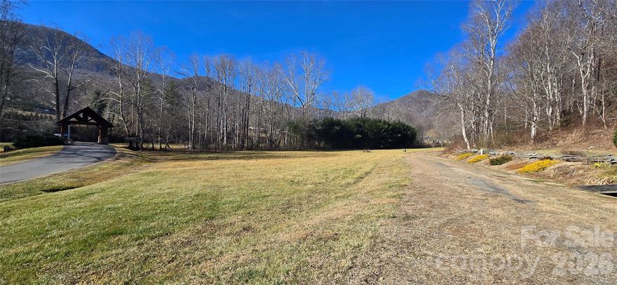 Welcome to the prestigious gated neighborhood of Rock Bridge Subdivision, located in the heart of Jonathan Creek, Waynesville, next to Maggie Valley. The roads are easy to access, with low elevation and a big blend of mountain homes. This is a wonderful community with a perfect blend of tradition, all wrapped up in one lovely place to call home! Be surrounded by nature at its best. Enjoy the Smoky Mountain National Park for hiking, camping, and all-around beauty! Enjoy the community as a safe haven and peaceful sanctuary. You are close to Cataloochee Ski Area, Cataloochee Ranch, and Cataloochee Valley to enjoy watching the elk graze. You're in a great location with easy access to Asheville, Dollywood, Knoxville, Atlanta, Chattanooga, and even Charlotte. If you're looking for the sounds of water to enjoy as you escape from busy work schedules, listen to the nearby creek.
