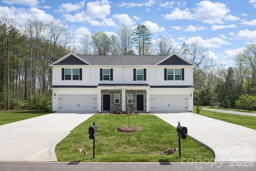 Back on the Market and fully complete! Only 1 home left and it is a beauty! Builder is also offering up to $10,000 towards closing cost if a preferred lender is used. An Exceptional Opportunity Awaits! Tucked away on a quiet street. This duet-style home offers great space and privacy! Imagine saving hundreds every month with NO HOA, while creating your own backyard oasis in this oversized, wooded lot.Inside, you’ll love the modern craftsman design featuring luxury vinyl plank flooring throughout the main level, LV tile in all baths and the laundry room, and a spacious open layout with 4 bedrooms designed for both comfort and function. Bright white and soft gray tones fill the home with a fresh, inviting atmosphere that feels both stylish and serene.A 16” privacy fence will be installed between the units, giving each homeowner their own sense of space and seclusion.The builder is offering excellent incentives—including closing-cost assistance and rate buy-downs—when using a preferred lender. SC Homes is known for delivering high-end finishes at an affordable price, and this home is no exception, with 36” staggered upper cabinets with granite counter tops and subway tile backsplash, creating a true designer kitchen feel.Just 14 minutes from the University area, 16 minutes from Uptown Charlotte, and 30 minutes to the airport, this location keeps everything within easy reach thanks to convenient access to I-485.Want flexibility? Don’t miss your chance to own a home that truly blends style, space, and savings—schedule your tour today!
Interior photos are representative. Buyer to verify schools.