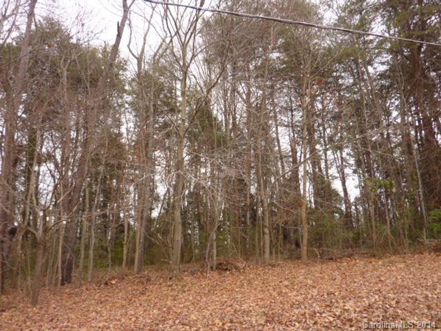 Water view lot in Mooresville. This subdivision has 2 day docks, a boat launch,  and a picnic area. 
This lot is close to I-77 and shopping