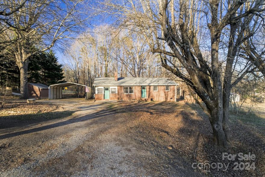 Welcome to your newly renovated retreat on 2.91 acres! This charming 2-bed, 2-bath home features original hardwood floors, two fireplaces, and a large bonus room. With updated plumbing, a new HVAC system, hardwood floors and LVP, and an updated kitchen, comfort meets modern convenience. Well was recently inspected. New septic tank installed in December 2024. Outside, enjoy a workshop, large shed, RV hookups, a pond, and proximity to Crowders Mountain for outdoor adventures. Live the lifestyle you've been dreaming of in this serene and stylish haven!"