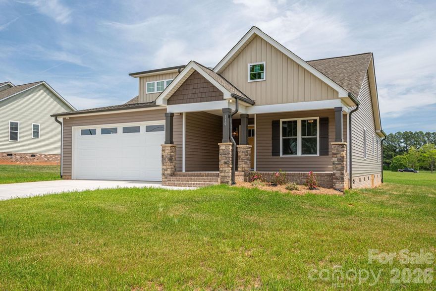 Beautifully Crafted 3-Bedroom Ranch with Open Floorplan on 0.75 Acres!
Welcome to this thoughtfully designed 3-bedroom, 2-bath ranch offering a spacious open floorplan and modern finishes throughout. Set on a generous 0.75-acre lot, this home features vaulted ceilings, luxury vinyl plank flooring, and a stylish kitchen complete with custom cabinetry, granite countertops, stainless-steel appliances, and a large center island—perfect for cooking, entertaining, or casual dining.  The open layout flows seamlessly into the dining and living areas, creating a warm and inviting space enhanced by tasteful designer touches throughout. The expansive primary suite includes a dual granite vanity, walk-in tile shower, and a large walk-in closet. A split-bedroom floor plan provides added privacy, with generously sized secondary bedrooms.  Enjoy outdoor living on both the covered front and rear porches, ideal for relaxing or entertaining. Additional highlights include a dedicated laundry room with a convenient drop zone and a two-car garage with extra storage space.  Located in a quiet, scenic setting while still being convenient to shopping, dining, and all that downtown Lincolnton has to offer, this move-in ready home blends modern comfort with peaceful country living.  Schedule your showing today!