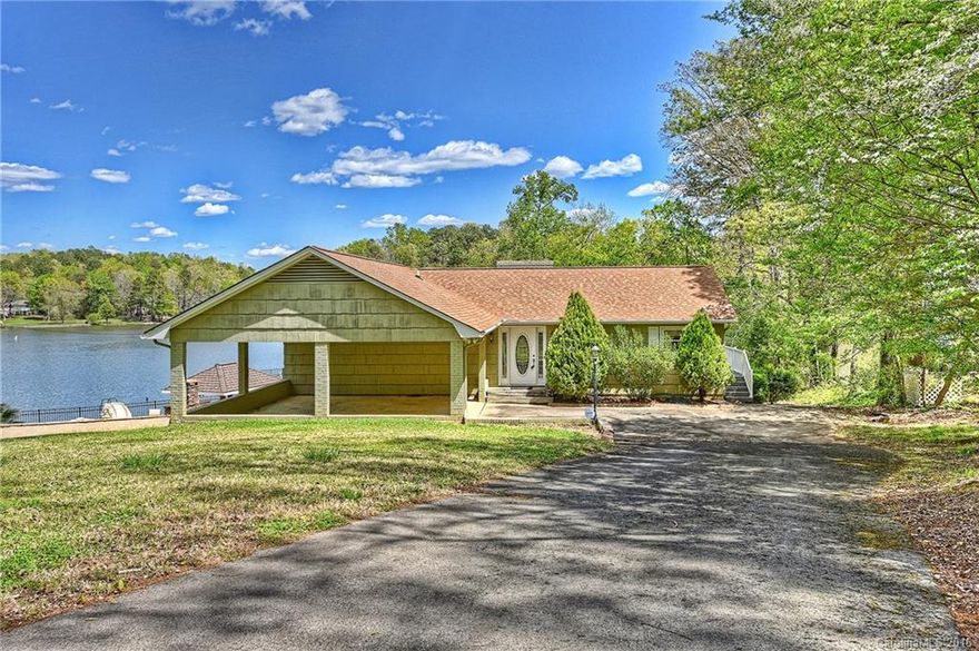 Breathtaking waterfront views and private boat house makes this home an absolute dream! One of the few homes in the community grandfathered with a personal boathouse and lake access! Enjoy the stunning lake views from the large deck and patio. Open floor plan with lots of natural lighting and two fireplaces to warm the living areas. 3 large bedroom, 2 bathrooms, 2 living areas in this spacious basement home.