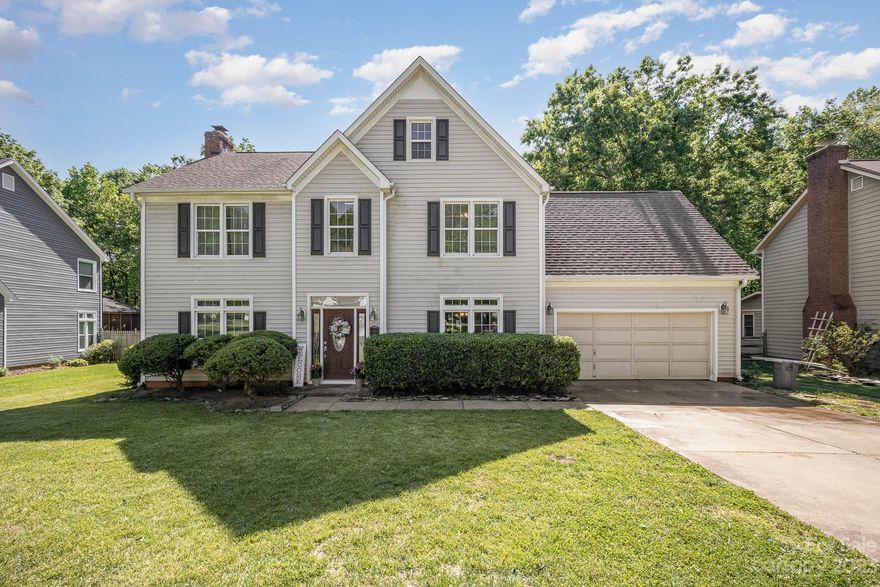 Traditional & stately 4 bedroom home tucked away in The Heathers community. Upon entering, you're greeted by your dedicated dining room to the right and your expansive living room/sunroom combination to the left, completed with a stunning brick fireplace. The sunroom features vaulted ceilings and leads you out to your large, level & fenced in backyard, including a large brick paver patio for summer evenings spent outside grilling! Back inside, your kitchen features SS appliances, endless countertop & cabinet storage and a breakfast area for more casual meals. Upstairs are all 4 bedrooms (4th currently being used as a playroom, but could be bed/office/theater/etc) including the primary retreat. With vaulted ceilings, endless natural light, a huge walk-in closet and en-suite with a stand-alone shower, soaking tub & dual vanities, what more could you want in your primary oasis? The secondary bedrooms are a good size & share a full bath. Bring your best offers & moving trucks!