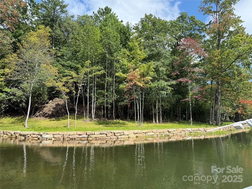 Two adjoining lake front lots on beautiful Lake Toxaway. Conveniently located near LTCC, golf course and marina and ready to build. Artfully crated seawall is in place including foundation for future boathouse. Engineered septic and building locations available for two lakefront homes. With 0.76 acre for one lot and 0.77 for the second we have a combined total of 1.53 acres with 300+ feet of lake frontage.
