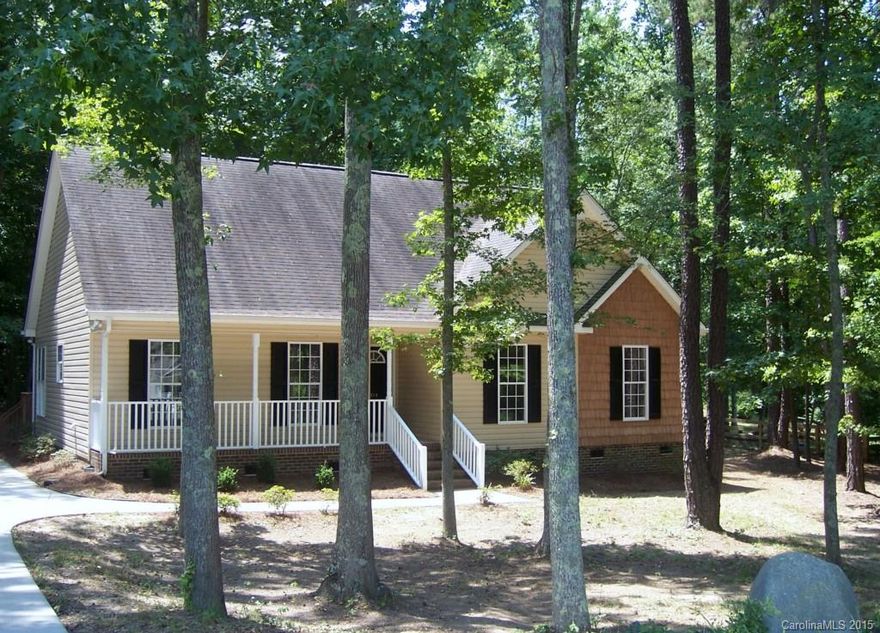 Great Location! No work to do here. New carpet, paint, lighting, appliances, and more. Large 16x24 site built workshop/shed, office, laundry room, vaulted & tray ceilings, deck, & large 1 acre lot.