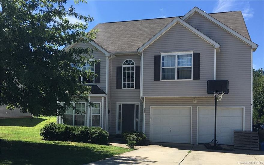 Tons of home an amazing price! Large lot with trees. Large driveway, patio, hardwoods in foyer, kitchen. Open floor plan Must see to appreciate all of the space for the money! Priced to sell in "as is" condition. Lots of possibilities!