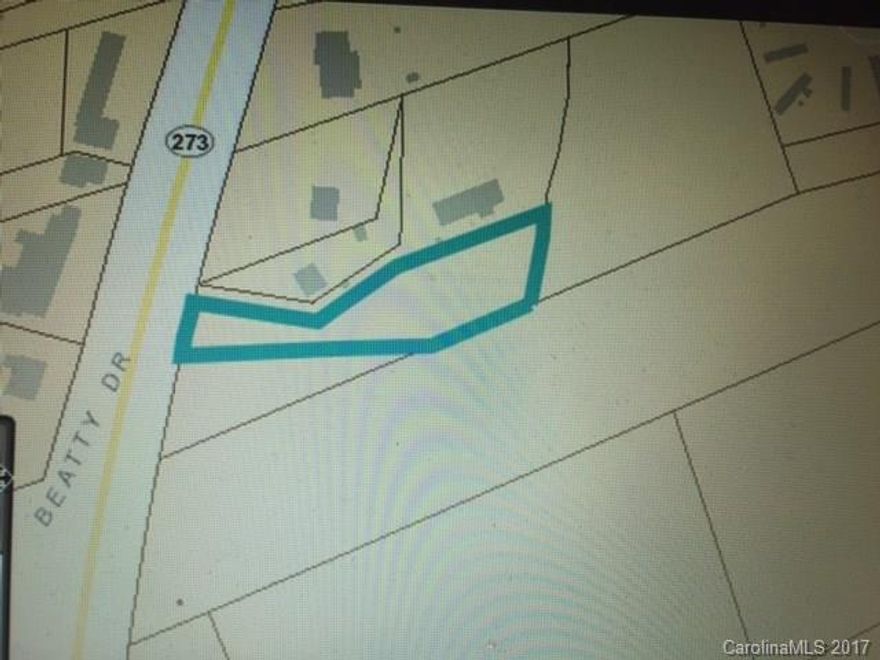 Land for sale off highway 273 in Belmont, NC.  Creek anchors land in rear.  Please call for detail information. 
this plot can go with another plot and a home next to this land.
