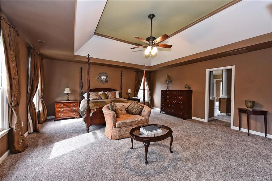 Stately Windsor on prime LRG cul-de-sac lot. Short walk to Clubhouse and school.. Open 1st floor stacked stone FP, lge kitchen and breakfast nook. Grand 2nd floor master with SPA bathroom and separate owners retreat. GIANT 3rd floor bonus room w/custom built-ins. New paint and carpet. Lge tri-level deck with lighting overlooks mature landscaping  NEW Roof, HVAC, Commercial gutters, Irrigation, cstm laundry rm, speakers, SS appliances. Quick Close!