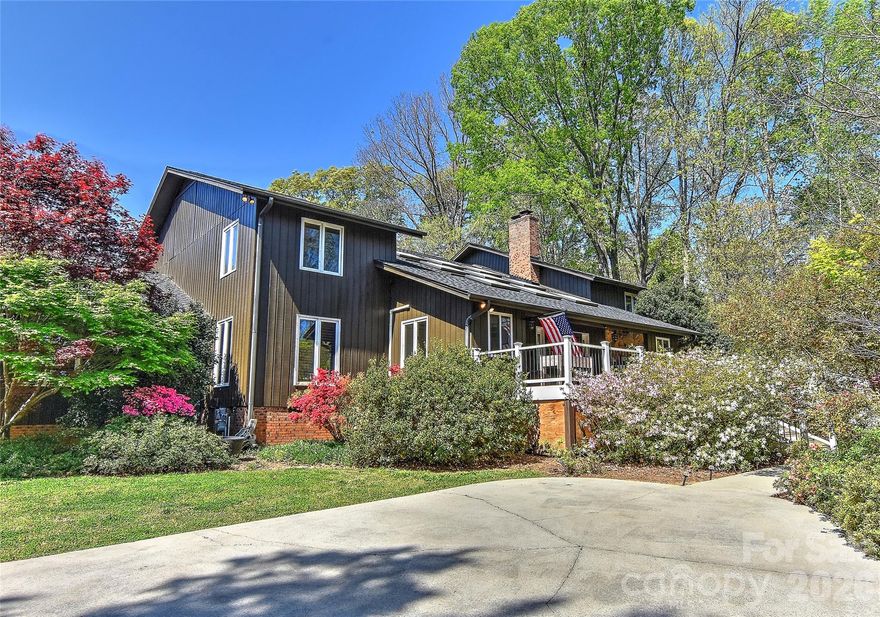 Fabulous California style home on a lush, private, peaceful cul-de-sac. A huge Trex floored front porch welcomes you into a spacious home featuring a huge atrium with a fireplace and an open staircase to the upstairs 4 bedrooms. The primary bedroom has a glamour bath w/ heated floors and built-in closets. Also, off the primary is a yoga /flex room. The upstairs opens to a full length porch which overlooks the salt water guanite pool and private back yard.
Downstairs a beautiful dining room with built-in custom cabinets and room for a large table. The kitchen has a thermador gas cooktop, two double ovens with convection and two dishwashers. A kitchen for a gourmet chef with beautiful stone counters and custom cabinets. A guest room/study is downstairs along with private bath, many closets and pantries. The large living room w/ a wood burning fireplace could be a wonderful game room. 
The garage is being used as a workshop/art studio. 
Roof 2-3 years old. 2 water heaters. Wired for an EV- charger does not convey. 
The two fireplaces and pool are being sold as is. No know issues.