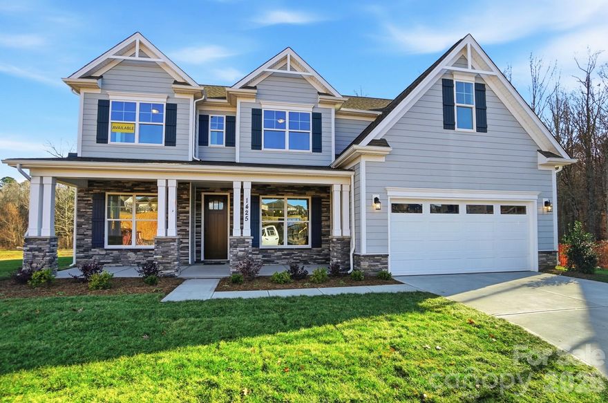 This beautiful home is READY NOW! This Charleston plan offers 5 bedrooms, 4 full baths, and more than 3,700 square feet of living space! The main floor features a guest bedroom & full bath, an office with French doors & Wainscoting, a dining room with tray ceiling, and a butler pantry with built-in wine cooler. The spacious kitchen has white cabinetry with a contrasting island, quartz counters, tile backsplash, a stainless range hood, and stainless appliances, including a gas cooktop. The upper floor includes the primary suite with luxury shower, 3 secondary bedrooms, a Jack-n-Jill bath, an additional full bath with a tiled 5-ft shower, and a loft with Enhanced Vinyl Plank (EVP) flooring. Outdoor space features a large covered rear porch and a paver patio with fire pit and seating wall. Other wonderful upgrades include 9-foot ceilings on the upper floor, tray ceilings in the foyer and primary bedroom, a gas fireplace in the family room, and a beadboard drop zone in the mud room. Neighborhood amenities include a pool, dog park, clubhouse & fitness center. Visit today and find out more!