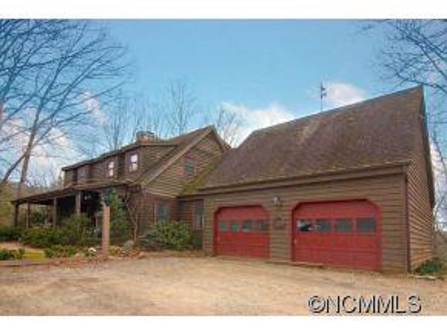 English charm farmhouse could be your private family getaway with 7 acres, rocking chair front porch, great room with massive stone fireplace. Large master suite w/clawfoot tub, kitchen with breakfast bar and eat-in dining with glass atrium, large formal DR, very open and inviting. Private acreage with several potential homesites with views and barn. 2 car extended garage with storage above. New carpet and dishwasher!