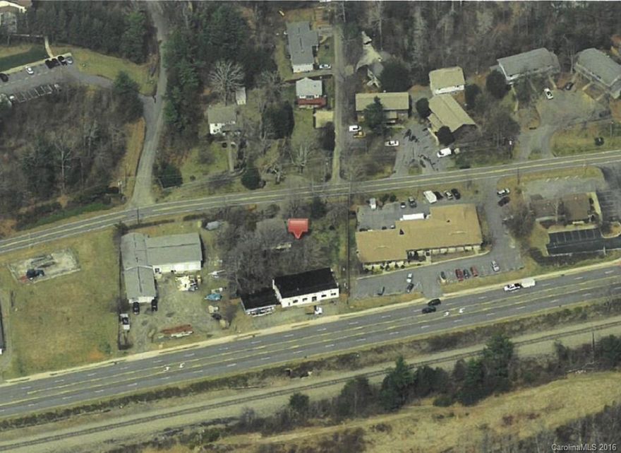 Excellent 966-square foot building for office, retail or artists' studio. High traffic U.S. Highway 70, two minutes west of Downtown Black Mountain. Landlord pays taxes, insurance and water. For lease at $8.50 per square foot.