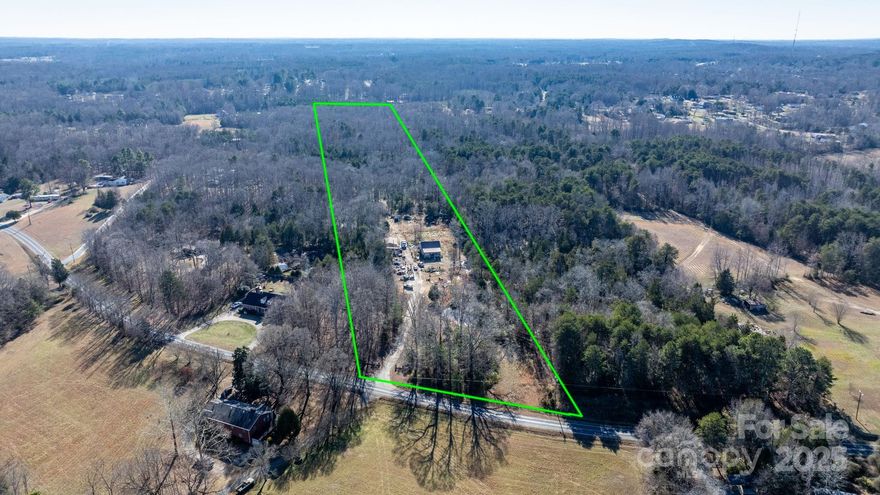 Situated on 13.7 wooded acres, the property at 4345 Fish Pond Rd in Salisbury, North Carolina, offers endless outdoor possibilities. This home with 3 bedrooms, 2 bathrooms, and 1,456 square feet of living space - Needs a bit of love but would make a wonderful home.

Conveniently located, it’s about 40 minutes from Charlotte, 20 minutes from Concord, and 15 minutes from downtown Salisbury. With a Zestimate of $374,000, it’s a great opportunity for investment or personal use.