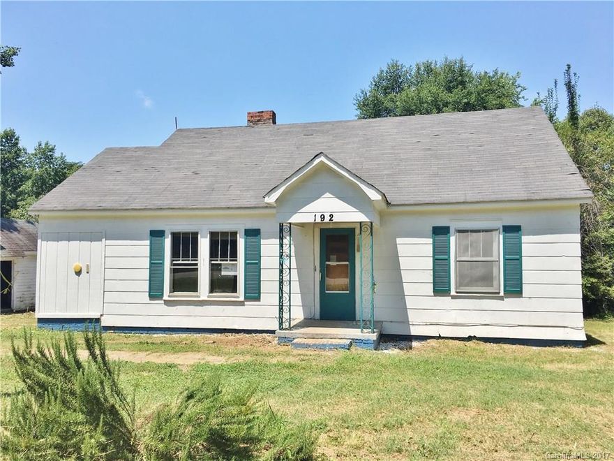 Looking for room to spread out on a road with lots of traffic? This property has a single family home that offers 2 bedrooms & 1 bath, nice size kitchen, dining room, & large living room. Large building that could be used as a shop. Great location just off I 77 & easy access to Mooresville & Lake Norman. This home is part of an online marketing event. DO NOT ENTER MOBILE HOME ON PROPERTY IT IS UNSAFE, HOLD HARMLESS NEEDED TO VIEW PROPERTY. No septic records per county no records from 1946.