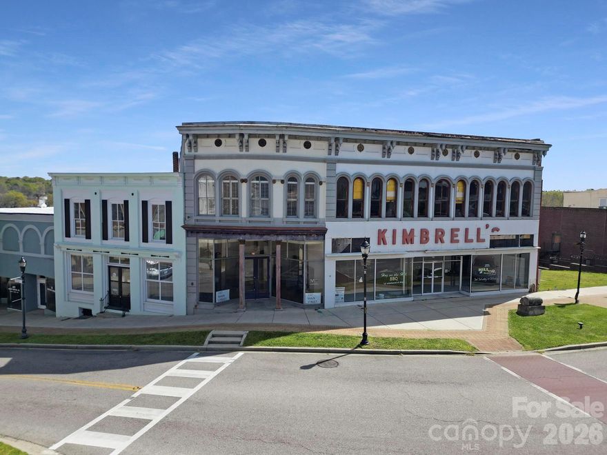 Circa 1900 commercial building with a big presence placed at the top of the hill in historic downtown Chester. Inside, you’ll find original hardwood floors throughout and a wide-open blank canvas as the main level has large display windows and skylights that bring in a ton of natural light. The first floor also features a new AC system, making it comfortable and ready for retail, studio space, or office use among other things. Upstairs adds even more potential with a full apartment setup, including an open-concept living area with a full kitchen, bedroom, full bath and large windows that stretch across the space, giving you great natural light and a picturesque view over downtown. A new split HVAC system was added upstairs recently for comfortable living. This property is set up for mixed commercial use, rental income, or both. Just under an hour to Columbia and Charlotte, it’s a solid opportunity in a growing area.
