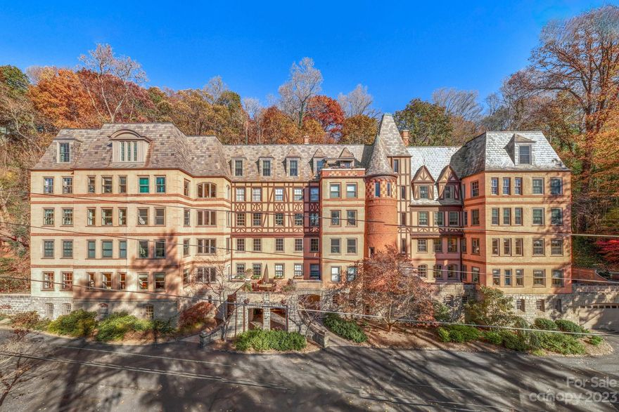 Constructed in the 1920s, the historic Longchamps building, combining Chateauesque and Tudoresque styles is located on Macon Avenue, just a short walk to the charming Grove Park Inn. Designed by renowned architect, Ronald Greene, known for Asheville's first skyscraper, the Jackson Building, Longchamps offers a unique blend of Old World charm and modern amenities. This one of a kind, light-filled, corner unit retains original embellishments while being updated for a more modern lifestyle with its open concept floor plan. Enjoy neighborhood walks along treelined streets with countless unique and architecturally stunning homes. Visit the Grove Park Inn for an afternoon at the spa or to witness one of the most spectacular sunsets you've ever seen or dine at one of their many restaurants. Just two miles to Asheville's eclectic downtown, residents have a plethora of entertainment and dining options that will never get old. Longchamps is the perfect balance of convenience and serenity.
