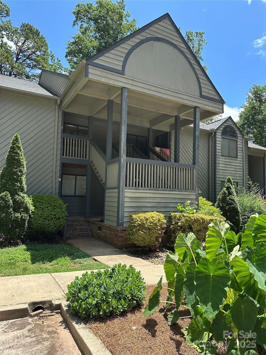 Lake Wylie Waterfront two bedroom, two bath second floor Condo in The Lake Villas-Complex.  The community has only six units with lake front access with community boat slips.  The home has water views as well as the community common areas to sit and relax and feel like you are on vacation.  Starting with your own back deck over looking the spacious yard, or the community fire pit by the lake.  The unit has a  Large living room with a gas fireplace, spacious kitchen with dining area, master bedroom with a walk in closet and a second bedroom with two closets. Twenty minutes to Rock Hill Fountain Park by car, twenty five Minutes to Papa Docs by boat, near a Walmart and soon to be new restaurants and shops.