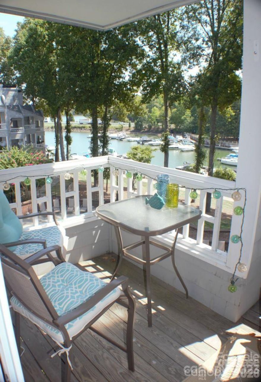 WATERFRONT PENTHOUSE unit, fully furnished with vaulted ceilings. Available MAY 15, 2026. 12-month lease term preferred; however, other lengths negotiable at a variable rate. Enjoy Lake & Pool with restaurant and bars just steps away. Bring your suitcase and move in! Fully Furnished condo including linens, dishes and utilities. Updated 2-bedroom 1 bath rental in the Harborwatch complex of Davidson Landing. Primary BR with queen bed, dresser and closet.  Secondary BR with bunk beds & trundle, desk, shelving unit and closet. Community amenities include the lake, pool, tennis, pickleball, and leased boat slips. Great deck space for relaxing and watching the boaters come & go for dinner at North Harbor Club or drinks & live entertainment at the Wine Cottage or The Cabin. Condo is on the top floor, 3rd floor but only 1.5 flights of steps to the unit.  Walk to downtown Davidson in 15 minutes.