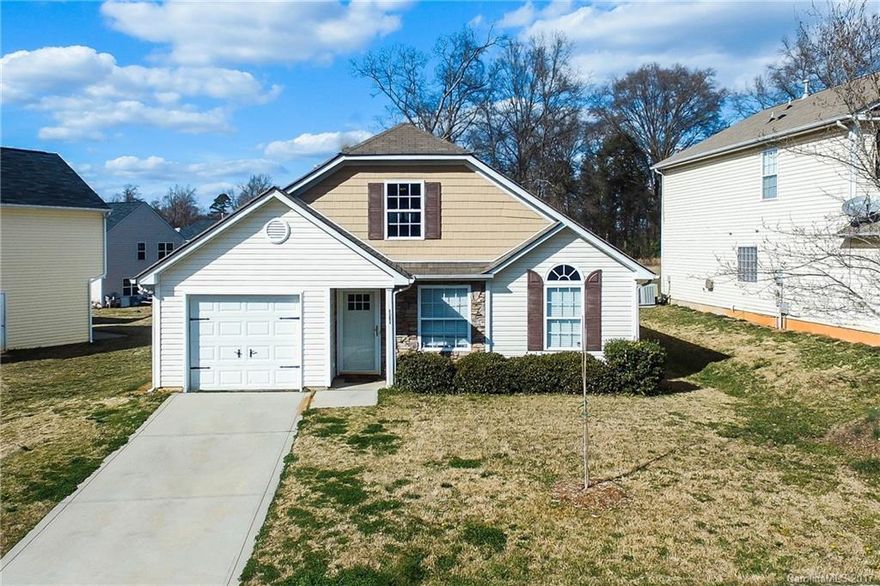 This adorable house WILL NOT LAST LONG! It has 3 bedrooms, 2 bathrooms, an open floor plan, vaulted ceilings, a bonus room, and a great kitchen with a large island. It has been freshly painted, has beautifully finished concrete floors in the main living area, has two bedrooms with walk-in closets, and offers a private backyard with a privacy fence.  Located very close to I-85, local stores and restaurants. Come see this beautiful home!