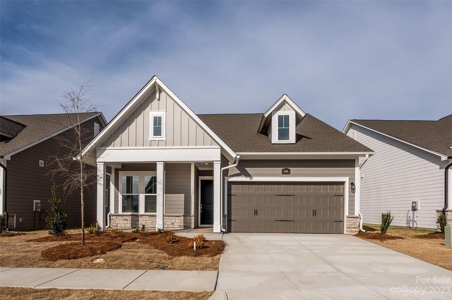 55+ Community! Enjoy ranch living at its finest!  Your spacious kitchen, the heart of your home, is a cook’s dream with a gas range, stylish quartz countertops, walk-in pantry, and built-in dining cabinetry.  Your owner’s retreat is private and includes a luxurious owner’s bathroom.   Secondary bedrooms provide for versatility as guest suites, hobby rooms, offices and more.    Take advantage of natural light in your sitting area with beautiful windows.   Your covered porch is the perfect spot to enjoy the seasons of North Carolina.