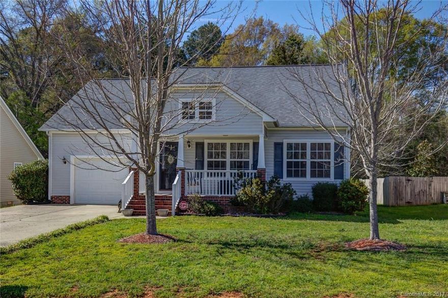 Cute as a Button!  This home is perfect for entertaining or spending quiet time on the rocking chair front porch or relaxing on the back deck.  Open floorplan, hardwoods throughout the main floor, updated kitchen with granite and island, 3 bedrooms on the main floor.  Lots of storage.  The only thing missing is YOU!