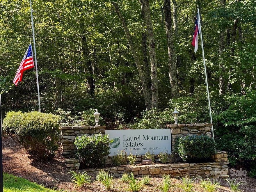 Beautiful, easy-build homesite in Rumbling Bald on Lake Lure!
This property offers a gentle, easy building site with mountain views and convenient access to all community amenities. Enjoy 5 nearby restaurants, 2 championship golf courses, a private beach on Lake Lure, 4 lighted tennis/pickleball courts, a wellness center, sports courts, and scenic walking trails—all within minutes of your doorstep. Just a short drive to shopping, groceries, Wineries, Chimney Rock State Park, the Tryon International Equestrian Center, the Blue Ridge Parkway, Hendersonville, and Asheville, and all the recreational gems of Western North Carolina. The perfect setting for your mountain dream home with resort-style living at its best!

The 2025 Property Tax paid was $208.20. A one-time capital fund fee of $1,100.00 is due at closing from the buyer, and the yearly HOA fee is 3,911.000. No Hurricane Helene damage or flood damage. Visit the Rumbling Bald On Lake Lure Website for community photos, restaurant menus, activity information, and more. Minimum home size is 1,800 square feet, and 900 square feet minimum on the main level. No RVs, Camping, Tiny Homes. Off-frame modular are welcome.