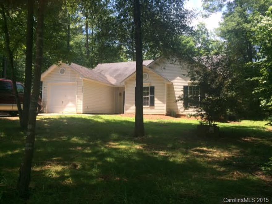 This darling house is move in ready and has a smart floor plan for this square footage. It has new carpet, vinyl, and paint and the house is getting new counter tops and water heater next week.  Vaulted great room/kitchen open concept has a gas log fireplace and the laundry room off the kitchen.  Master bedroom has walk in closet and master bath has linen closet. One car garage with concrete drive is nestled in the trees for shade and privacy. 2-10 home warranty provided by seller.  Must see!