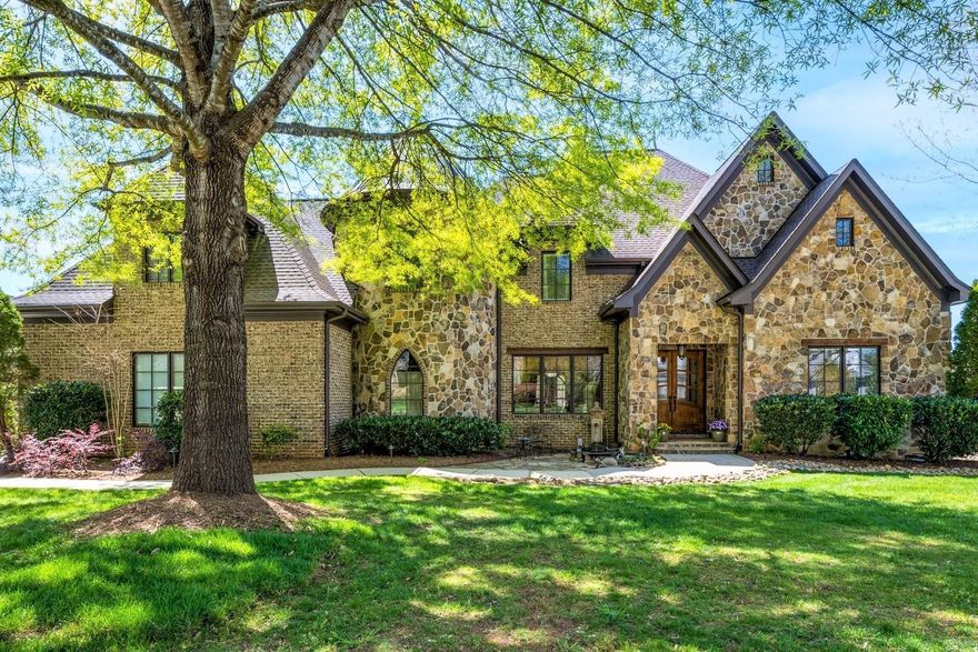 Stunning custom home in the prestigious gated Chatelaine! Wait to be wowed by this luxurious estate constructed with expensive bricks and stones showcasing a magnificent architectural style!  Impeccable attention to detail throughout with top of line materials carefully selected for interior and exterior! The backyard is truly HGTV worthy with a covered outdoor kitchen, a soothing Koi pond, great water view of the neighborhood pond, the handcrafted pergola and beautiful paver walkways. Top-rated Weddington schools! New sod will be installed in the front yard on Saturday (April 1)!