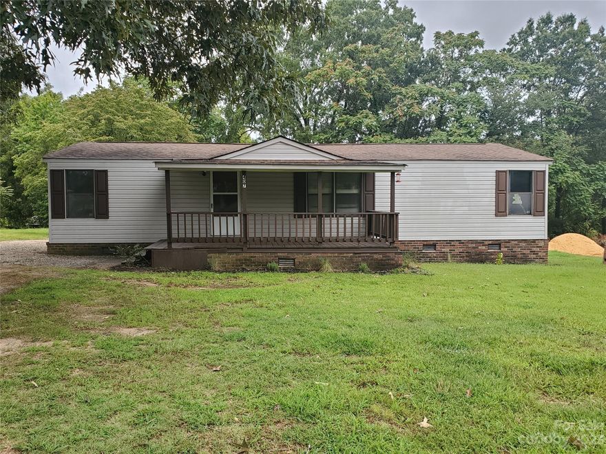 Very nice 3 bedroom, 2 bath doublewide on .31 acre lot. Large living room, ceiling fan. Covered front porch and nice deck on back of home. Detached carport and storage shed. Legal description on GIS is incorrect. Property was subdivided. New legal description is shown on survey in attachments. Deed description also shows old property lines. Located close to grocery shopping and just a few minutes from Landis or downtown Kannapolis. GIS map doesn't show the property has been divided.