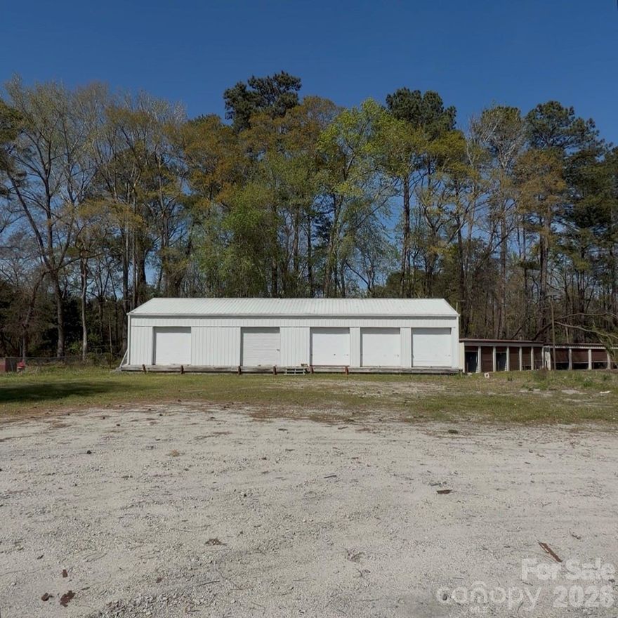 Value-add opportunity in Hartsville, SC featuring a 22-unit storage property situated on two parcels totaling .83 acres with additional land for potential expansion! The property is partially occupied, with 5 units currently leased to 4 tenants generating approximately $700 per month in income.

The site includes multiple storage buildings along with a larger structure equipped with roll-up doors, offering flexibility for a variety of storage or commercial uses. The existing layout and surplus land provide an opportunity to increase revenue through lease-up of vacant units and potential development.

Conveniently located with road frontage and easy access, this property is well-suited for investors, owner-operators, or those seeking a small commercial asset with growth potential.

Property includes two parcels (057-00-02-026 and 057-00-02-027). Buyer to verify zoning, permitted uses, income, and development potential.