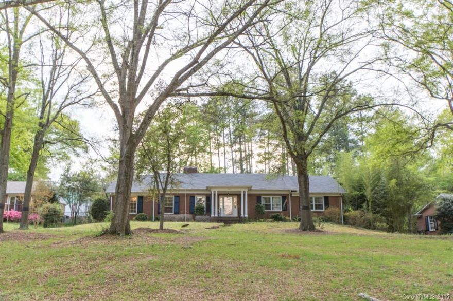 Lovely hardwood floors, newly renovated kitchen with shaker cabinets, stainless steel appliances, wonderful island for entertaining and gourmet cooking, large laundry room, HVAC  3 years young, 4 bedrooms or 3 bedroom and office, roof 2 years young and gorgeous tile and granite in the kitchen.  Open and airy throughout with large bedrooms, all this on .75 acre lot.  Actually 2 lots with this home.  Superb mature trees.
A MUST SEE!