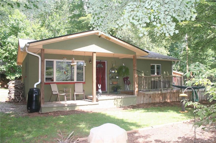 Immaculate Cottage on a large private setting. Open and bright floor plan with many updates---new Hickory hardwood floors, New laundry, New Roof, New Water Heater and updated bath. 2 New outbuildings with spacious workshop, tool shed, garden shed all with power. Spacious new deck with terraced garden beds. Apple/Peach/Cherry trees.Garden space. New Privacy Fence. Covered front porch. If you are looking for a peaceful home in the country that is "move in" ready, this is it !! Must see today !