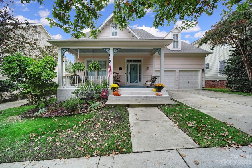 Primary Bedroom on main overlooking the beautiful community trail system. Open floorplan to kitchen, great room, and breakfast area. Kitchen displays a one level island, pantry, and built in breakfast area with custom made table. Sunroom added along back of the house three years ago, private entrance off primary bedroom. Primary bathroom set with double vanities and jet tub. Antique windows into the new sunroom and plantation shutters on main level. French doors to private office at entry. Upstairs there is new carpet and paint with three more bedrooms and two full baths. Lots of attic storage in a bedroom and pull down. Overlooking the community trail system and convenient to pocket parks. Newly painted exterior. Walking distance the dining, fitness, coffee, wine and more. Community amenities include two pools, four playgrounds,12 miles of walking trails, festivals, holiday gatherings, and so much more! Don't miss out on this highly sought after community.