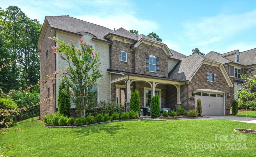 Stunning 6 bedroom estate home with pool! This spacious home features an abundance of designer details. The open floorplan from the gourmet kitchen to the coffered ceiling Greatroom allows unrestricted flow. Entering from the covered front porch you will be amazed with the attention to details. The home office on the left and dining on the right with a tray ceiling. Continue to the Greatroom with a stacked stone fireplace. The kitchen features soft close cabinets with lower cabinet roll out shelves and Kitchen Aid appliances include a 36 inch gas cooktop, wall oven with microwave, and dishwasher. Main level guest bedroom with full bath. Primary bedroom suite on second level with panel wall and bath features oversized vanity with tub and shower. Sixth bedroom is currently used as second level den. New carpet on second level and main guest bedroom. Third level bonus room for games or movie night has a half bath. Outdoor oasis features a covered patio and heated saltwater pool/hot tub.