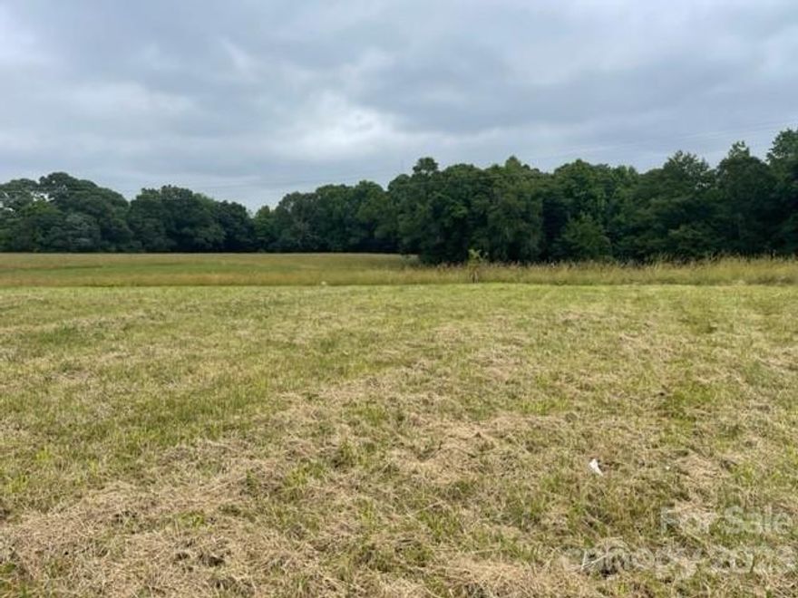 Beautiful, level and cleared .76 acre lot in the Cool Springs area in New Salem Estates, surrounded by custom homes.  County water available at the street, and septic permit already in place chambered (conventional) gravity system for a 3 BR home (buyer can apply with county to expand to a 4 BR) seller was planning on building a 3 BR ranch + bonus on this lovely lot, but plans changed.  Room was left on permit for a pool and a detached garage.  Street traffic is minimal, as road ends just past this lot.  Lovely views of farmland behind this property.  NO HOA, but developer must approve plans and elevations.  Bring your own builder, no time limit to build.  Super nice lot!