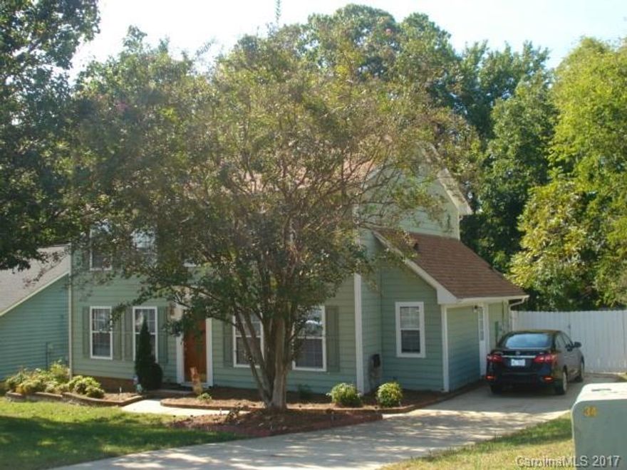 Location! Beautiful and well maintained home with the most beautiful outdoor fireplace sitting are. Home features new architectural roof 2015. Painted inside and out 2015. New ceramic floor in kitchen. New laminate wood floors downstairs. DR was converted to a fourth bedroom. Great looking kitchen with granite countertops and lots of windows. Great school district!! All amenities just a few min away.  Easy access to I-77, I-485, I-85. Charlotte Douglas Airport and Uptown just 15 min away.