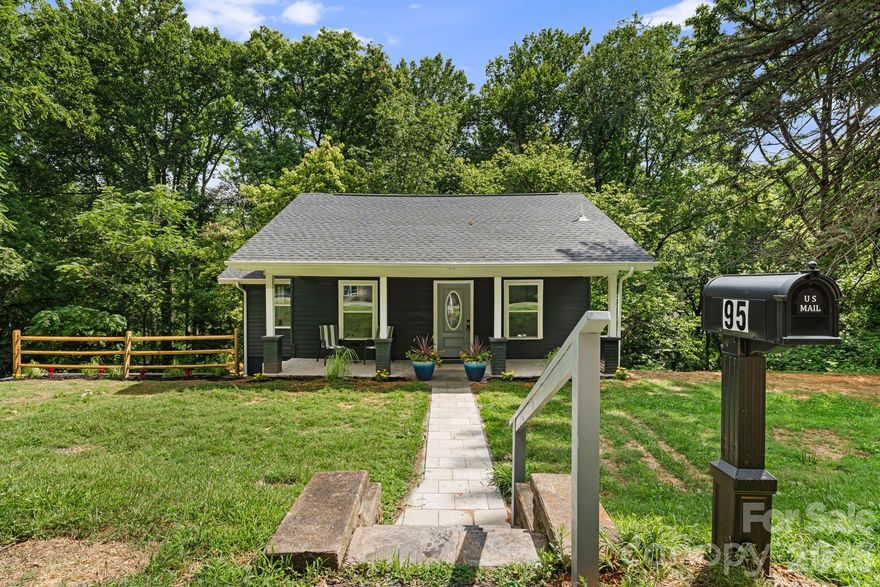 **BACK ON MARKET** Financing fell through giving you a chance at this fantastic home! One of the best priced 2 -3 bed/2 bath properties at only $248/sq ft! Charming meets modern in this beautifully reimagined single family home. Additionally, one of the 2 flex spaces meets ANSI requirements for a bedroom. This residence has been meticulously renovated from the ground up—taken down to the studs and thoughtfully designed for today’s lifestyle. Enjoy the peace of mind of owning a solid almost-new home: brand new kitchen with gleaming appliances, sparkling new bathrooms, new roof, new HVAC, updated plumbing, new well, new 200 amp electrical system, newly installed driveway, and energy-efficient windows. Freshly painted inside and out, the home invites you in with bright, airy living spaces and modern finishes throughout. Nestled on a quiet street, this home offers a tranquil retreat just 20 minutes from vibrant downtown Asheville. Quick access to I-40 makes travel a breeze, yet you'll appreciate the pastoral, serene setting. Unwind on your covered front porch or entertain on the spacious backyard patio. Don’t miss the opportunity to own a newly renovated home with classic charm close to all Asheville has to offer.