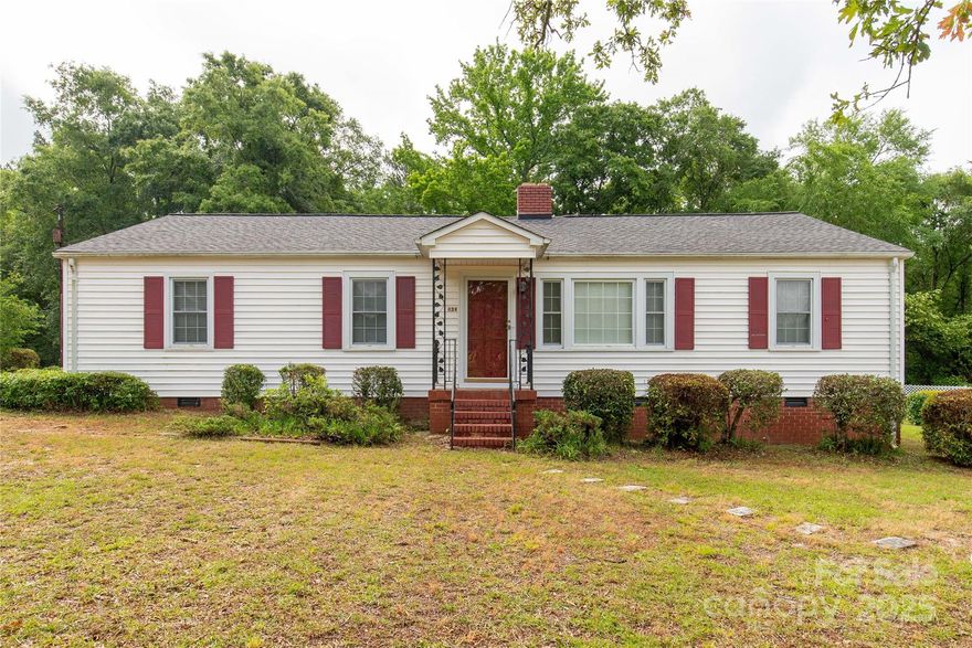 Awesome rural home in Kershaw on 1.07 acres.  This home sits up on a ridge w/a long paved driveway- open & wooded setting for privacy & priced to sell!  There is a covered detached one car carport, a shed & lots of parking in the rear of the home.  The back door has a ramp so no steps to inside.  Home has been modified for handicap accessibility.  The Primary bath has had the shower removed to allow wheelchair access but one could be reinstalled.  There are also wide double doors for access.  Grab bars are in both bathrooms.  The large kitchen has tons of cabinets & counterspace.  The eat-in space is perfect for a table for 6.  No appliances are included except for the electric water heater that is less than 3 years old.   The Living Room has a fireplace that has never been used.  The den has a built-in bookshelf & closet so it could be used as a 4th bedroom.  The hall bath has an updated tiled walk-in shower.  This home has plenty of closets too.  Inspections done-Being sold "as is".