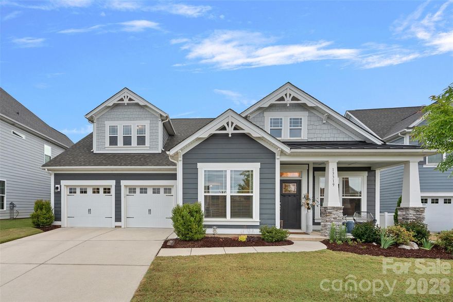 Stunning Huntersville home designed for effortless living and elevated entertaining! A welcoming covered front porch leads into gleaming hardwoods and a thoughtfully designed interior. Private office with French doors and a sun-filled dining room set the tone, flowing into an ideal open floor plan. The gourmet chef’s kitchen anchors the home with a massive eat-in island, quartz countertops, gas range, scullery and a separate wine bar, all opening seamlessly to the spacious dining area and living room complete with a cozy gas fireplace.

The main-level primary retreat offers comfort and privacy with a custom walk-in closet and a spa-inspired bath featuring a large Roman shower. An additional main-level bedroom with private en-suite is perfect for guests. Upstairs, a generous loft provides flexible living space along with an additional private bedroom and full bathroom.

Enjoy year-round outdoor living on your screened porch overlooking the oversized patio complete with an outdoor kitchen, built-in gas grill, a custom bar with seating, and firepit. Situated on one of the most private lots in the neighborhood, offering a peaceful backdrop for effortless al fresco living, entertaining, and everyday enjoyment. Prime Huntersville location close to shopping, dining, downtown Huntersville, and convenient access to I-485 and I-77.
